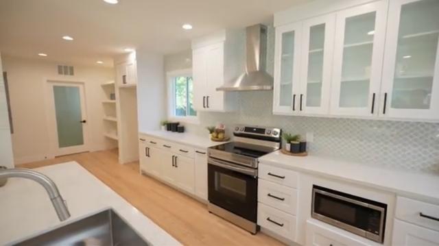 Modern White Kitchen Renovation with Quartz