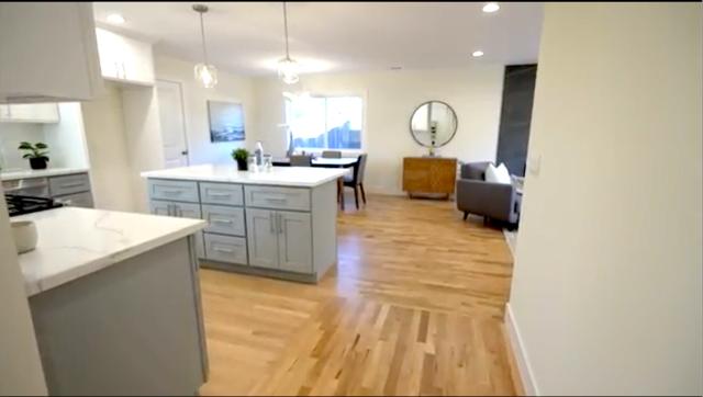Hardwood Flooring Installation for Open Concept Kitchen and Living Room